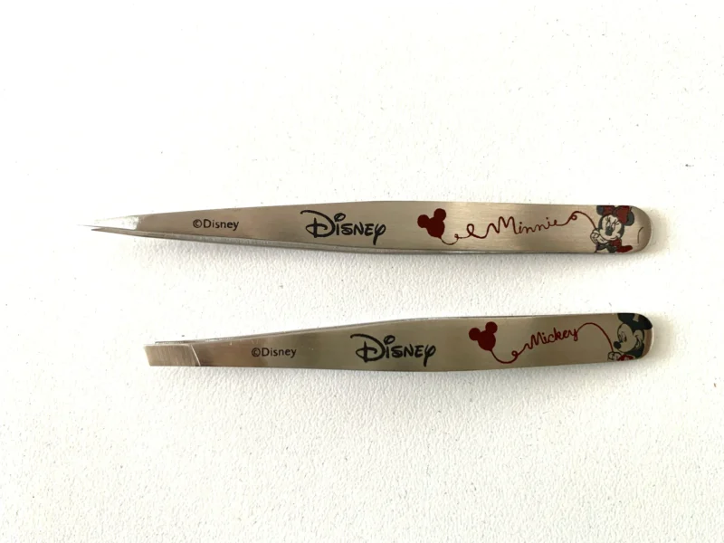 SET DE PINZAS - TWEEZERMAN - DISNEY - COLOR ACERO - x 2 PINZAS